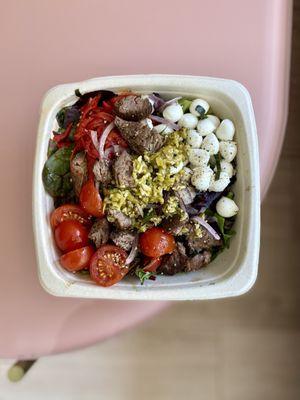 Delivery: Keto Italian Steak Salad - Organic Grilled Steak, Roasted Red Pepper, Tomato, Mozzarella, Mixed Baby Lettuce, Antipasto Dressing