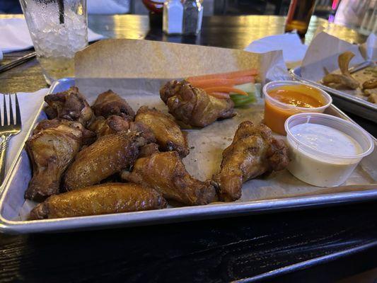 Smoked bone in wings.  Ranch and mild sauce