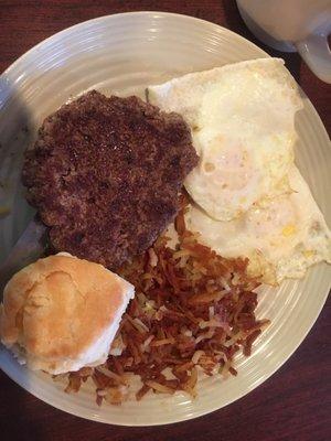 Hamburger steak breakfast was really good. Gravy not pictured. Great biscuits!