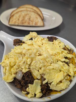 Our Southwestern Skillet is a must try. Diced potatoes topped with cheddar, onions, chorizo and eggs! Try it as a skillet or an omelette.