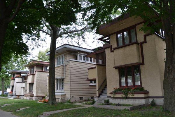 Photo of the four Model F Duplexes along Burnham Street.