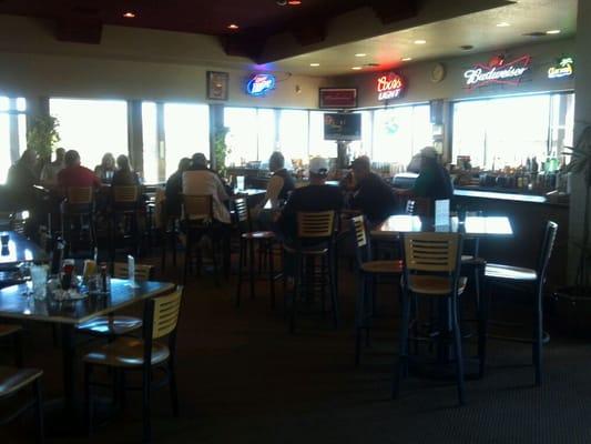 Full bar with a view!...and golfing! Nice!