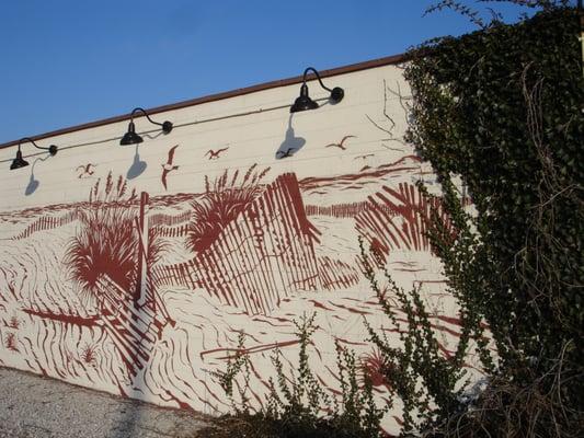 The Dunes mural on the side of our building