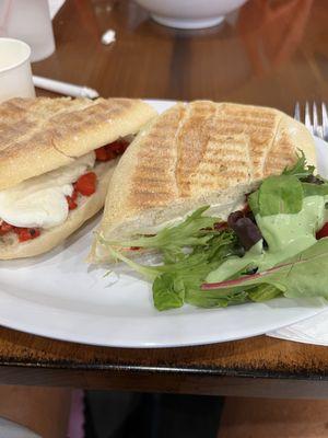 Burrata and roasted peppers with truffle oil panini