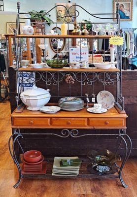 China, vintage glassware, even the kitchen counter is for sale.