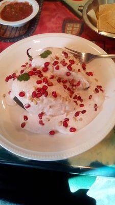 Delicias Chiles en Nogada...stuffed poblano peppers with a delicious cream sauce and pomegranate seeds