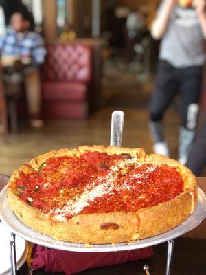 Deep dish pizza custom with 1/2 cheese and 1/2 jalapeños and mushroom