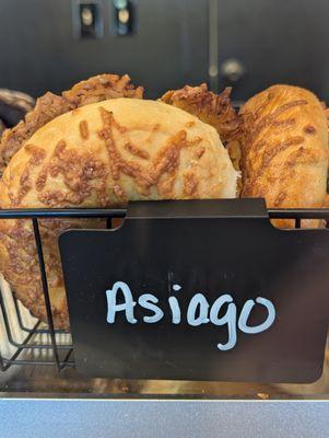 Asiago bagel (contains dairy).