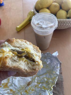 Sausage egg and cheese biscuit with a cinnamon latte