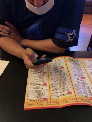 handsome guy deciding what to order