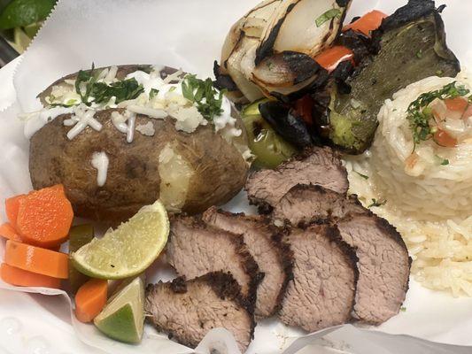 Tri tip plate special with baked potato at la chat Mexican grill