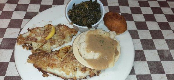 Grilled fish, mashed potatoes and greens with hot water cornbread