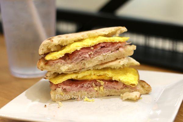 Inside of The Parma Breakfast Sandwich ($7.99) - house-made bread, egg, Italian ham, mascarpone