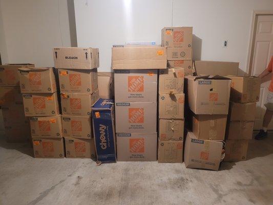 Some of the 52 boxes that the company delivered but DID NOT PACK. We bought them and packed them.