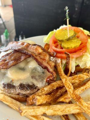 Bacon cheeseburger with mushrooms and Cajun seasoned hand cut fries