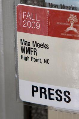 Max Meeks press badge from Fall 2009. Photo from the Greensboro News & Record.