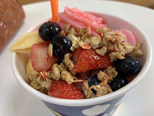 Vanilla & strawberry yogurt with strawberries, blueberries and granola. Yum!