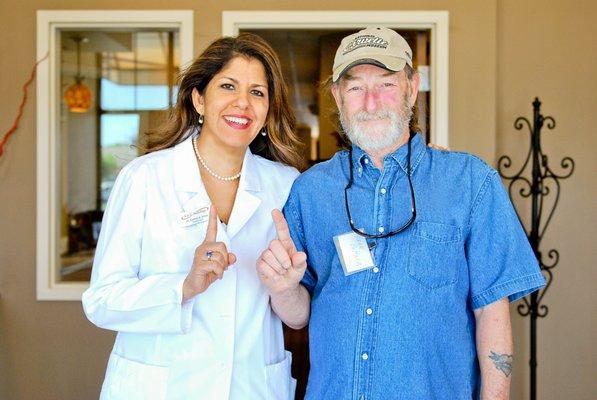 Dr. Kamal Elliot, AuD with our very first patient at A&E Audiology