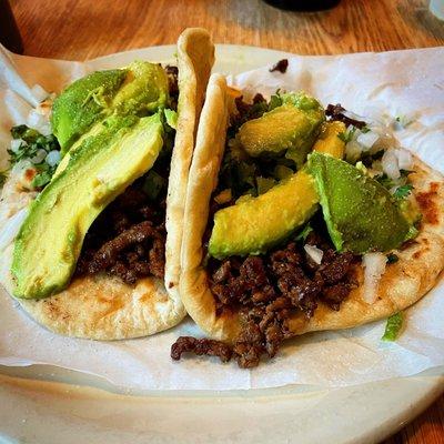 Carne asada with cilantro, onion, and avocado on flour tortilla. Tough to beat!  See more on IG @cheatday_sa