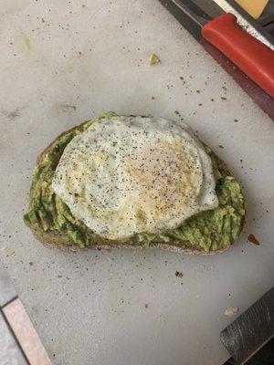 Avocado toast with over easy egg