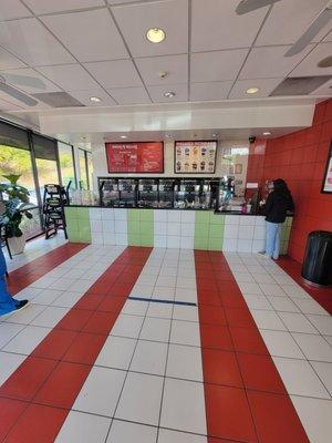 Inside view. Staff very friendly & warm cust svc. This is not self serve froyo spot. Daily 12 flavors, lots of topping options (4/13/22)