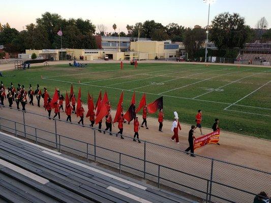 Here comes the marching band.