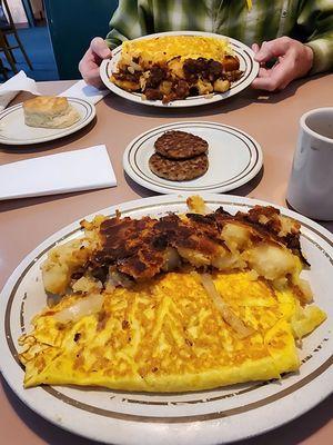 Chese omelet and home fries and corn beef hash omelet.  Awsome!