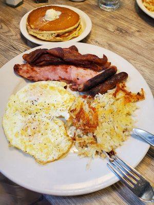 "The Big Breakfast" with Ham, 2 sausage and bacon 2 eggs, including 3 Buttermilk Pancakes $13.75  Friday 12/8/2023