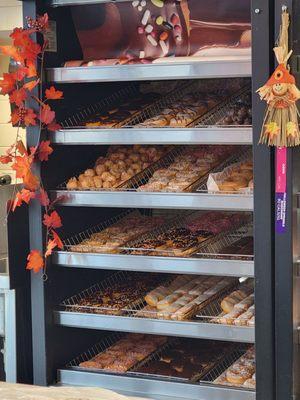 Donut display behind the counter