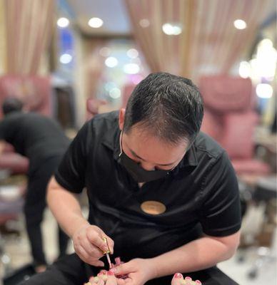 Tom at work at a pedicure.