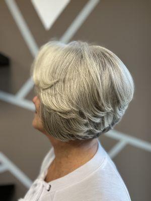 she came in with shoulder length hair and left with a gorgeous stacked short cut done by Suly