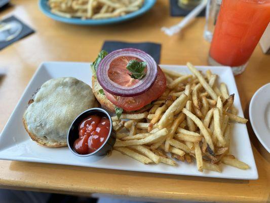 Burger and fries and a mock tail.