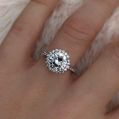 Halo round diamond ring