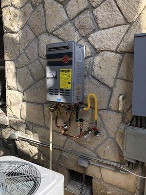 Outdoor tankless water heater installation.