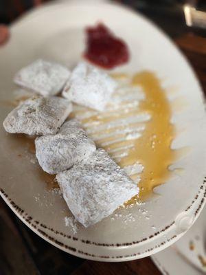 Beignets with honey and strawberry preserves