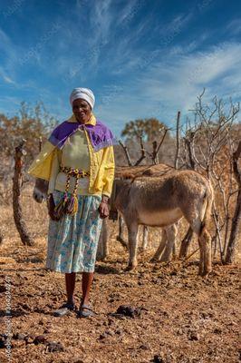 Women in Uganda work constantly while men hang about in the marketplace idle