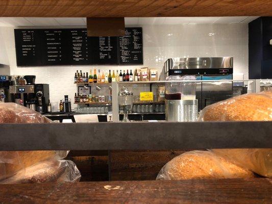 Bar table behind the bread and view of the front