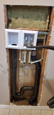 Installing a new laundry valve box with water hammer arrestor