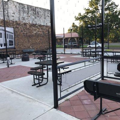 Outdoor seating w/ 8 tables & stage