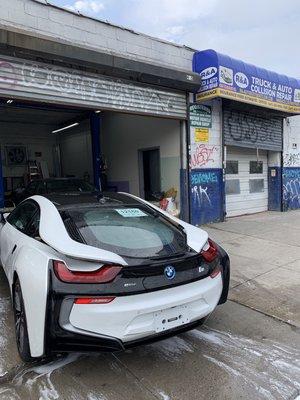 The Entrance to shop is the Blue Awning!