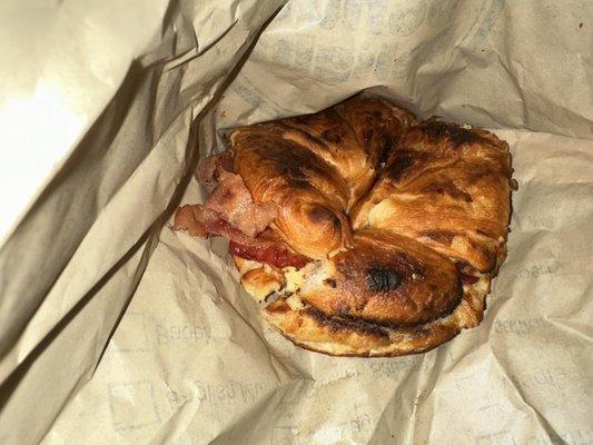 extra crispy bacon egg and cheese on a croissant