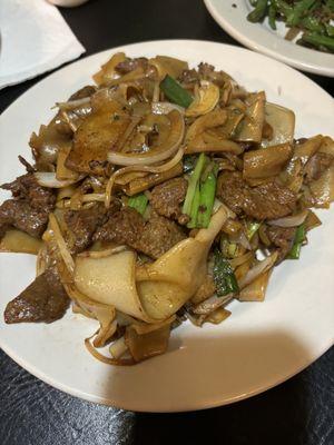 Dry stir fry beef and wide noodles