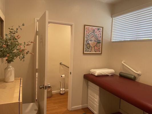 Treatment room with private bathroom