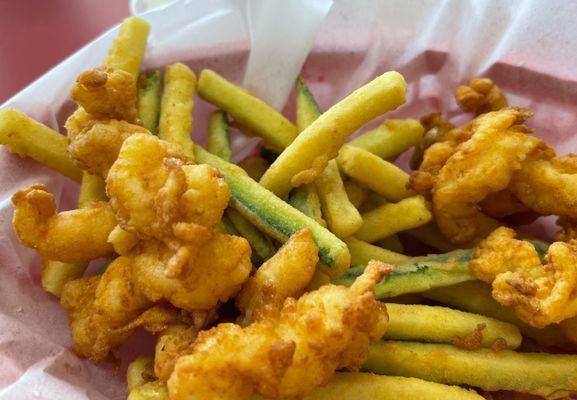 Shrimp with zucchini fries.