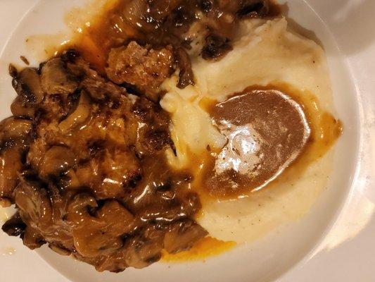 Salisbury Steak w/mushroom gravy and mushrooms with mashed potaoes.