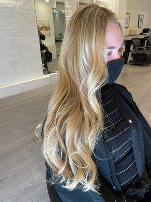 Sandy highlights and tape-in hair extensions