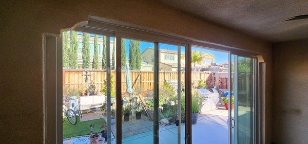 Added awesome 16ft wide 8ft tall patio door to patio opening