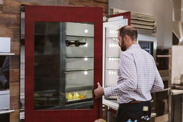 Monogram Refrigerator with red leather custom panels.