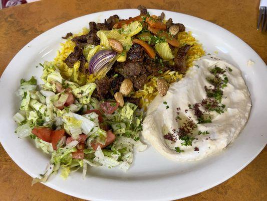 Lamb Mix Shawarma Plate Fresh lamb mix, saffron rice, hummus, salad, grilled veggies. Pita is included.