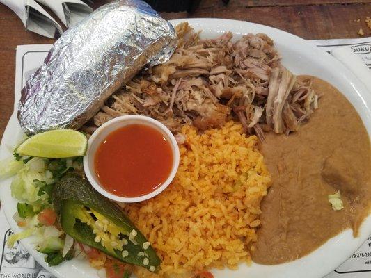 This is my plate of Carnitas beans and rice. The tortillas were fresh and hot. The chips and salsa were great.